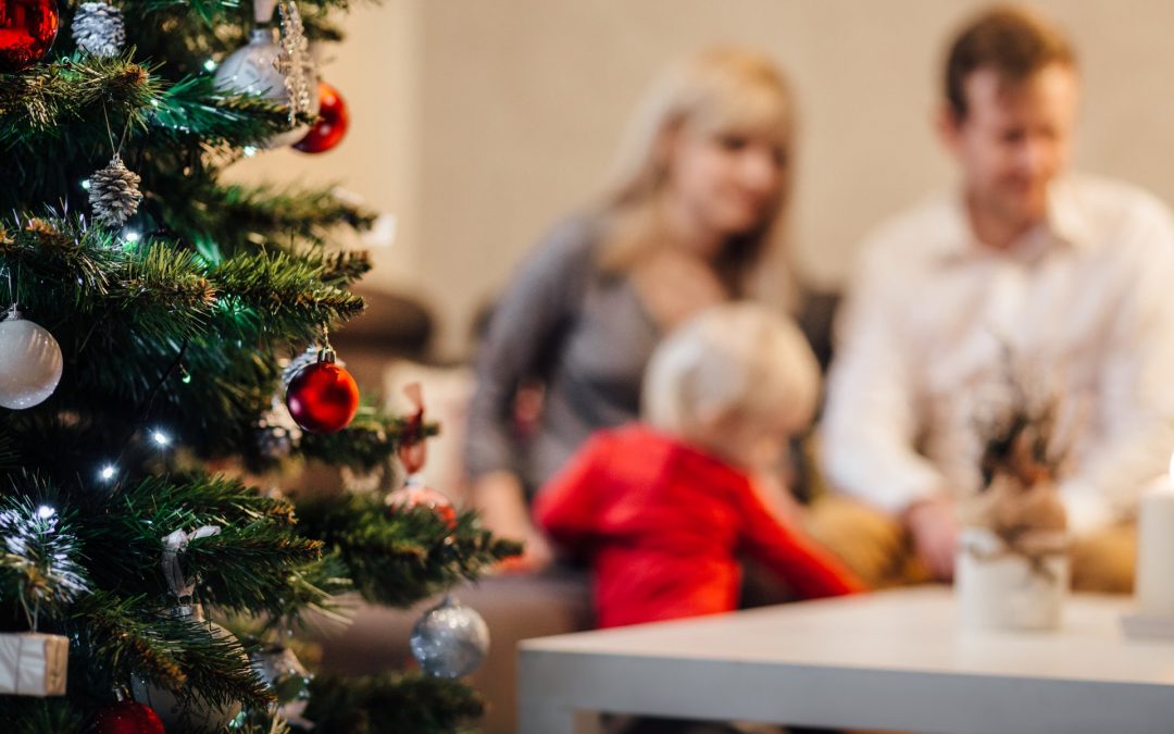 close up of christmas tree during family celebration